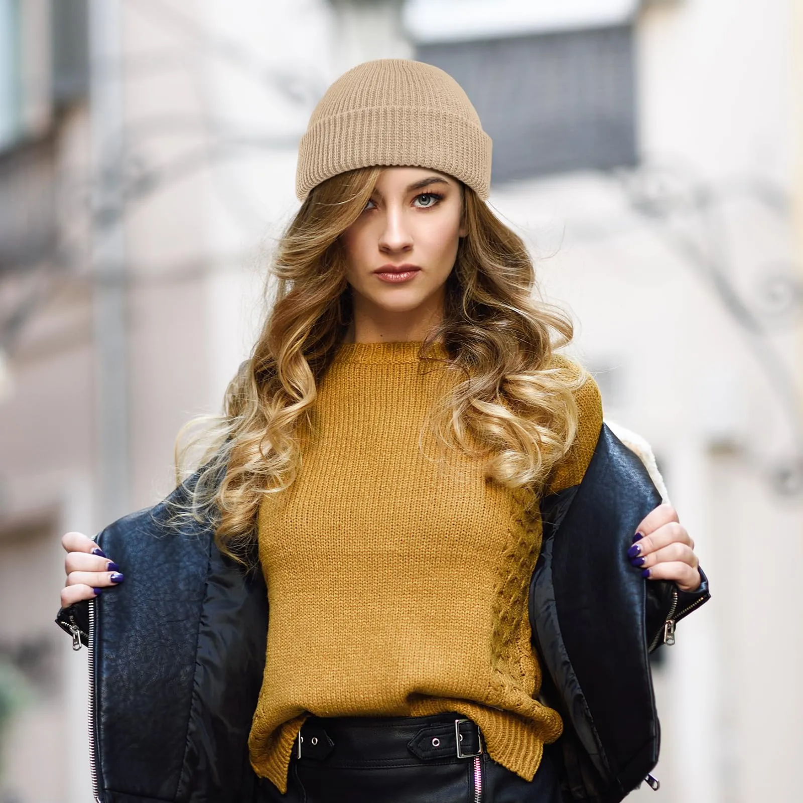 Woman wearing a stylish knit beanie